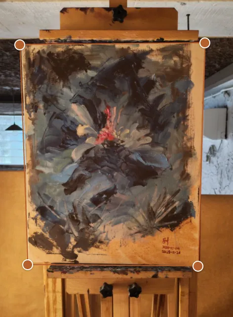 Before: photo of a painting on an easel with four corner handles for straightening